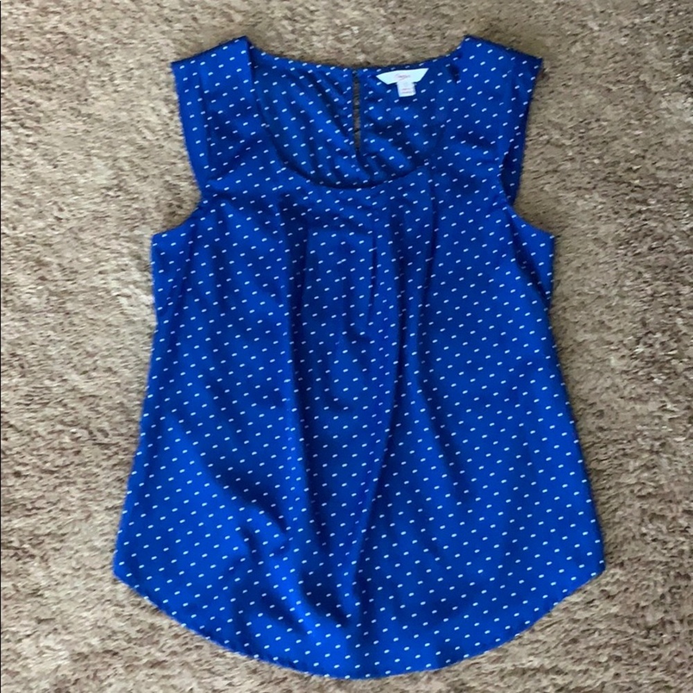 Blue shirt with white polka dots